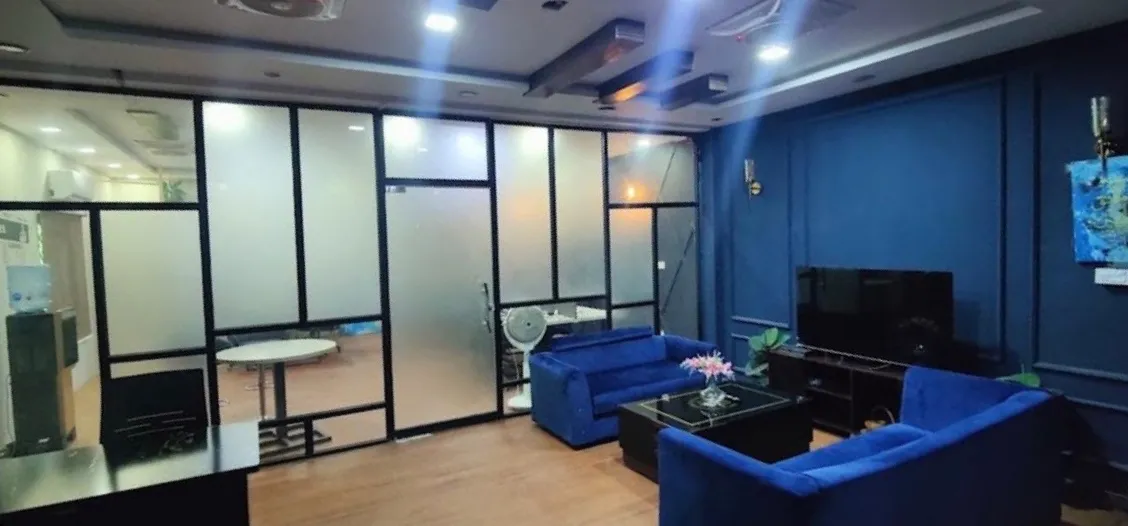 Client lounge with sofas and a meeting room